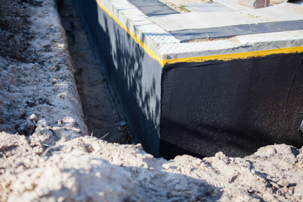 Professional Waterproofing technician working in King, WI